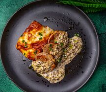 Свиная вырезка с картофельным гротеном и грибным соусом