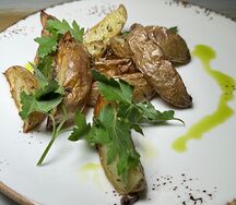 Картофель запечённый дольками