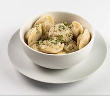 Пельмени со свининой и капустой