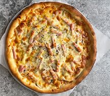 Пицца с ветчиной и грибами большая
