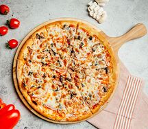 Пицца с ветчиной и грибами