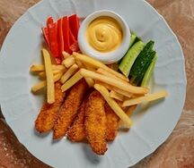 Куриные наггетсы с сырным соусом