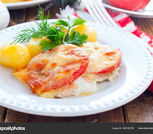 Треска запеченная с помидорами