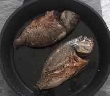 Минтай, запеченный с картофелем