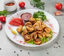 Пельмени жареные