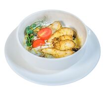 Раклет с курицей и грибами в сливочном соусе, запеченный под сыром