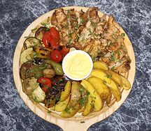 Бедро куриное с овощами