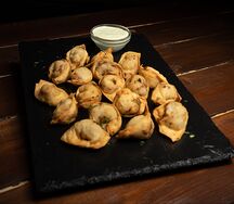 Пельмени жареные