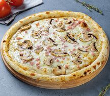 Пицца с ветчиной и грибами