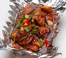 Баклажаны с побегами чеснока