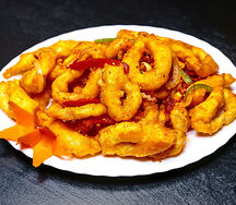 Кальмар кольцами в кляре с арахисом и перцем