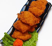 Куриное филе с сыром в сухарях
