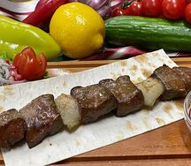 Шашлык из говяжьей печени с курдюком