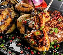 Жареная телячья корейка с овощами