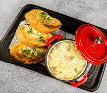 Жюльен из грибов с морепродуктами и сыром пармезан