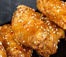 Куриные крылышки в кисло-сладком соусе