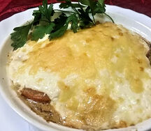 Кабачки, запеченные с помидорами