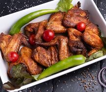 Запеченые маринованные куриные крылышки