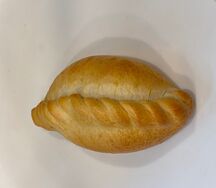 Пирожок с яйцом и рисом 