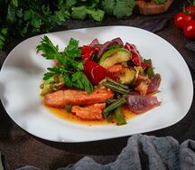 Тилапия с овощами