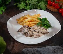 Говядина под сливочно-коньячным соусом