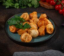 Пельмени жареные 