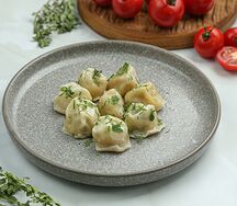 Пельмени с курицей и пармезаном