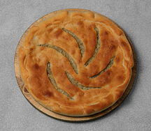 Осетинский пирог с говяжьим фаршем и капустой