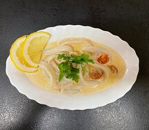 Кальмар, тушеный в сливочном соусе