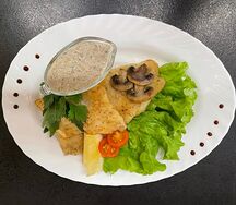 Судак под грибным соусом