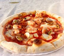 Пицца с морепродуктами