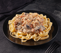 Рагу из белой рыбы и креветок с пастой лингвини