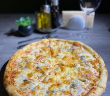 Пицца с ветчиной и грибами
