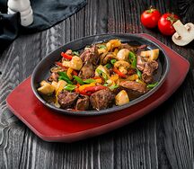 Скворчащая сковородка из баранины