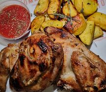 Цыплёнок с картофелем, запечённый в дровяной печи