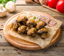 Шампиньоны с беконом на углях