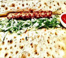 Бурум с люля-кебабом из свинины в лаваше