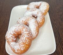 Набор из 4 пончиков в сахарной пудре