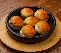 Грибы, жаренные с сыром