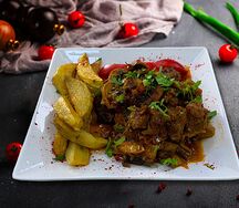 Мясо с грибами и овощами