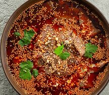 Ассорти из говяжьих потрохов в остром соусе по-сычуаньски