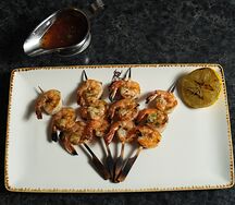 Креветки, обжаренные на гриле