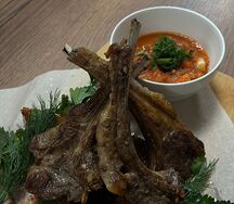 Седло Ягненка с помидорами конкассе