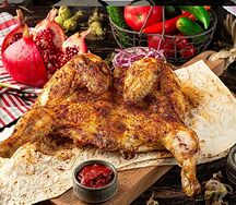 Цыплёнок запечённый с грибами по-царски