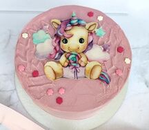 Детский розовый торт с пони