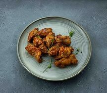 Куриные крылышки в кисло-сладком соусе