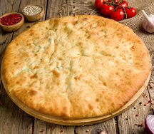 Осетинский пирог с сыром и зеленью