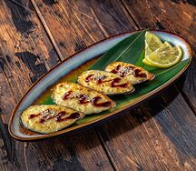 Запеченные мидии в сырной шапочке