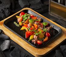 Шипящая сковородка