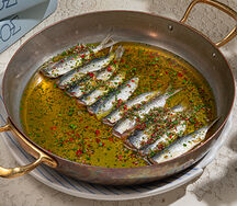 Сардины, запечённые с травами